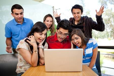 10453596-group-of-surprised-students-at-the-university-with-a-computer